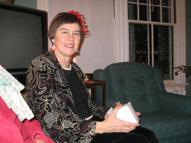 Marty with new flashing earrings and a candle that was put out of its misery quickly.